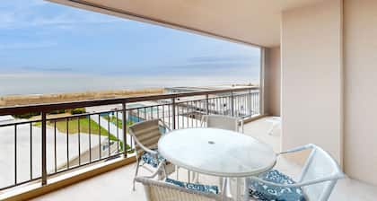 Oceanfront condo with ocean & bayside balconies, central AC, & easy beach access