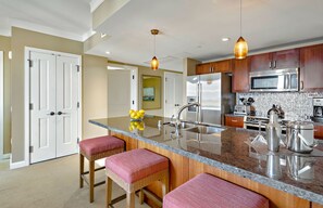 Fridge, microwave, oven, stovetop - Maui Resort Rentals: Honua Kai Hokulani 814 - Top Floor 1BR w/ Partial Ocean & Mountain Views! (Lahaina)