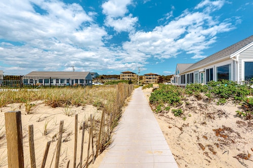 Newly Renovated Studio with AC, Grill – steps from Private Beach