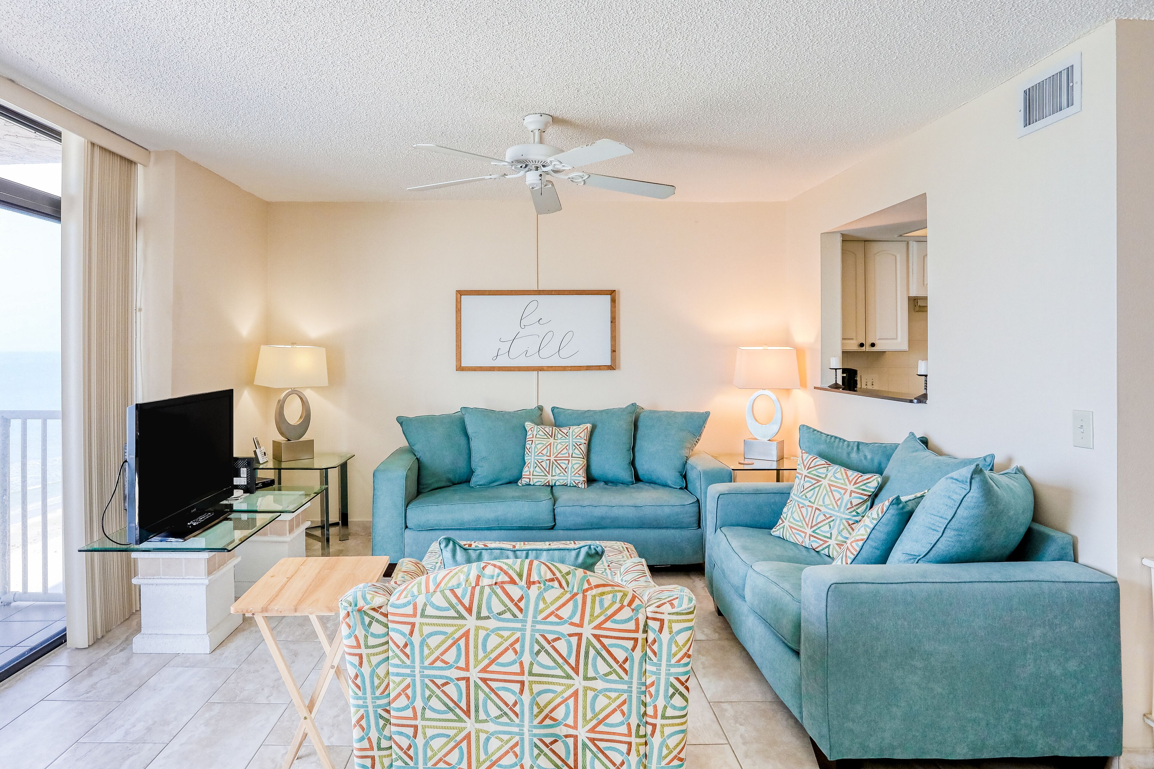 Delightful waterfront condo with sweeping views, beach access, balcony & pool