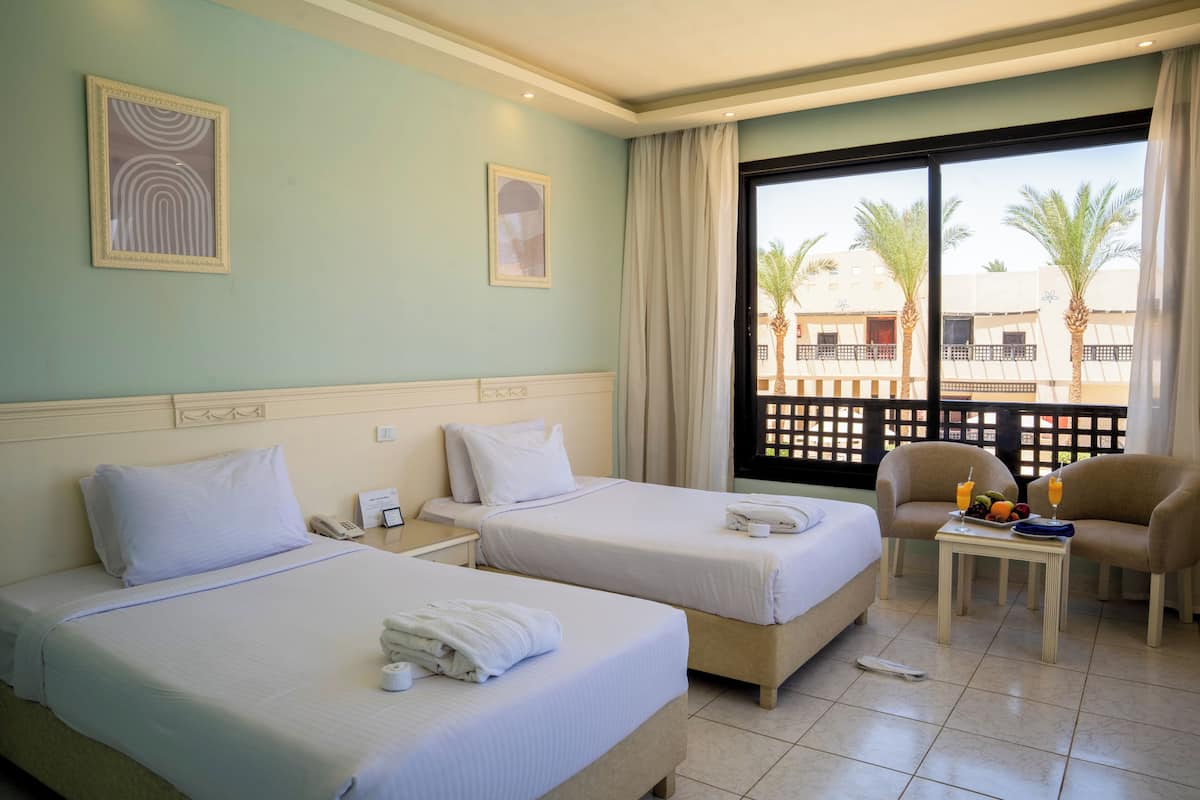 Deluxe Twin Garden View | Premium bedding, in-room safe, blackout drapes, WiFi