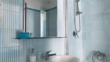 Combined shower/tub, jetted tub, hair dryer, bidet