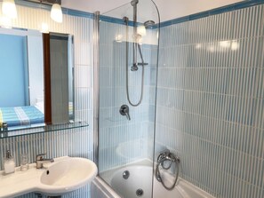 Combined shower/bathtub, jetted bath, hair dryer, bidet