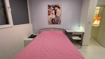 2 bedrooms, desk, iron/ironing board, travel crib