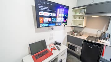 Estúdio | Cozinha privada | Geladeira, micro-ondas, fogão, cooktop
