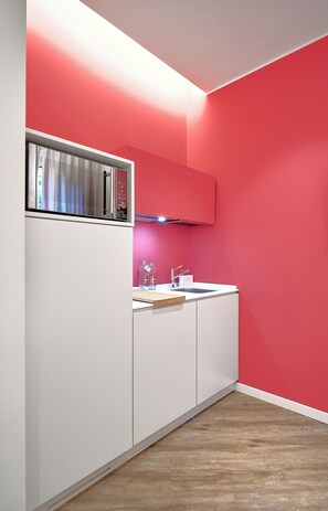 Fridge, microwave, stovetop, coffee/tea maker