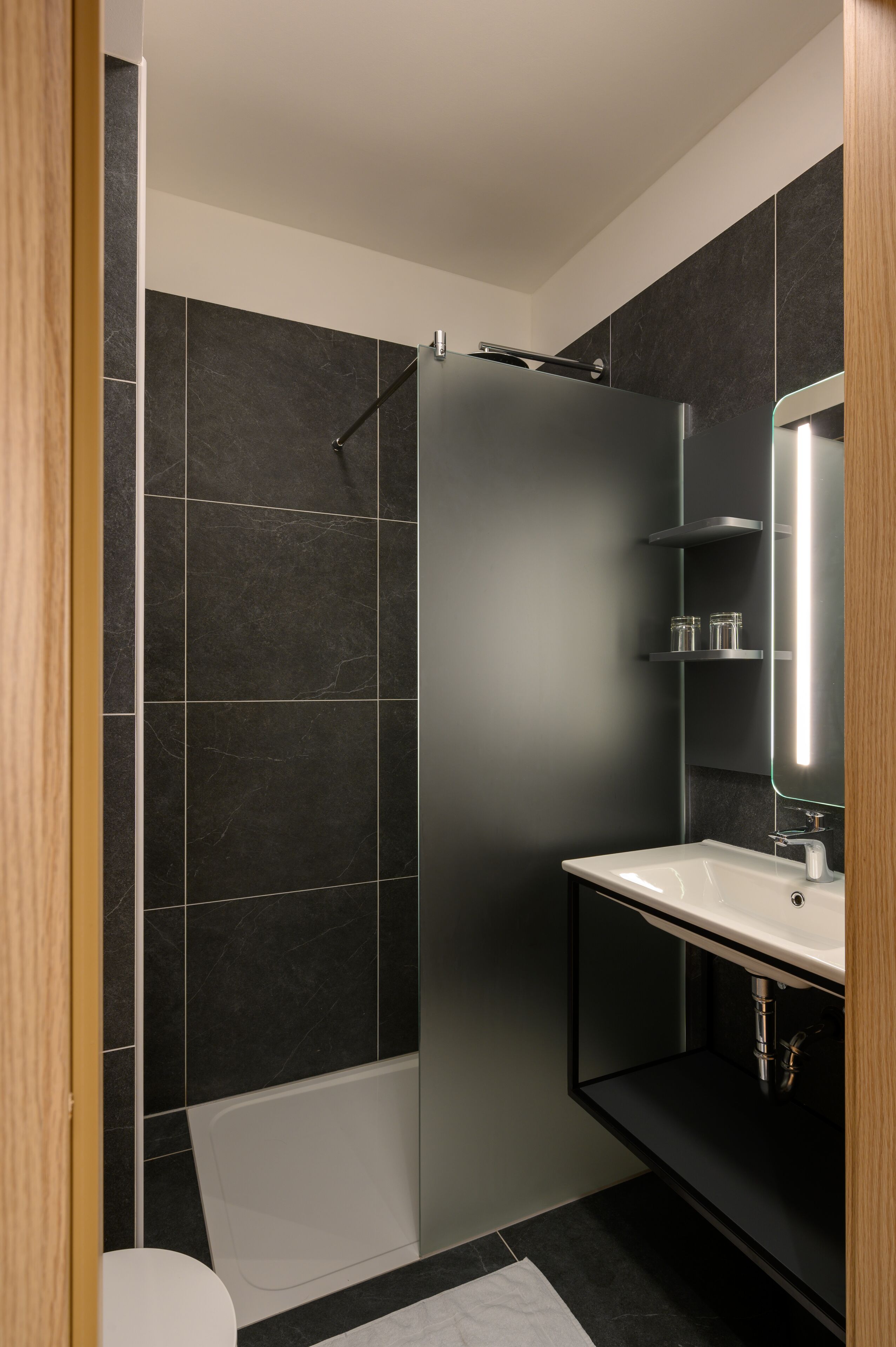 standard double room, city view | bathroom | hair dryer, towels