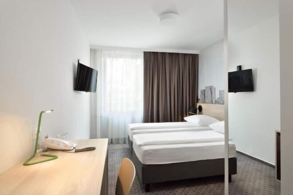 Desk, free WiFi, bed sheets