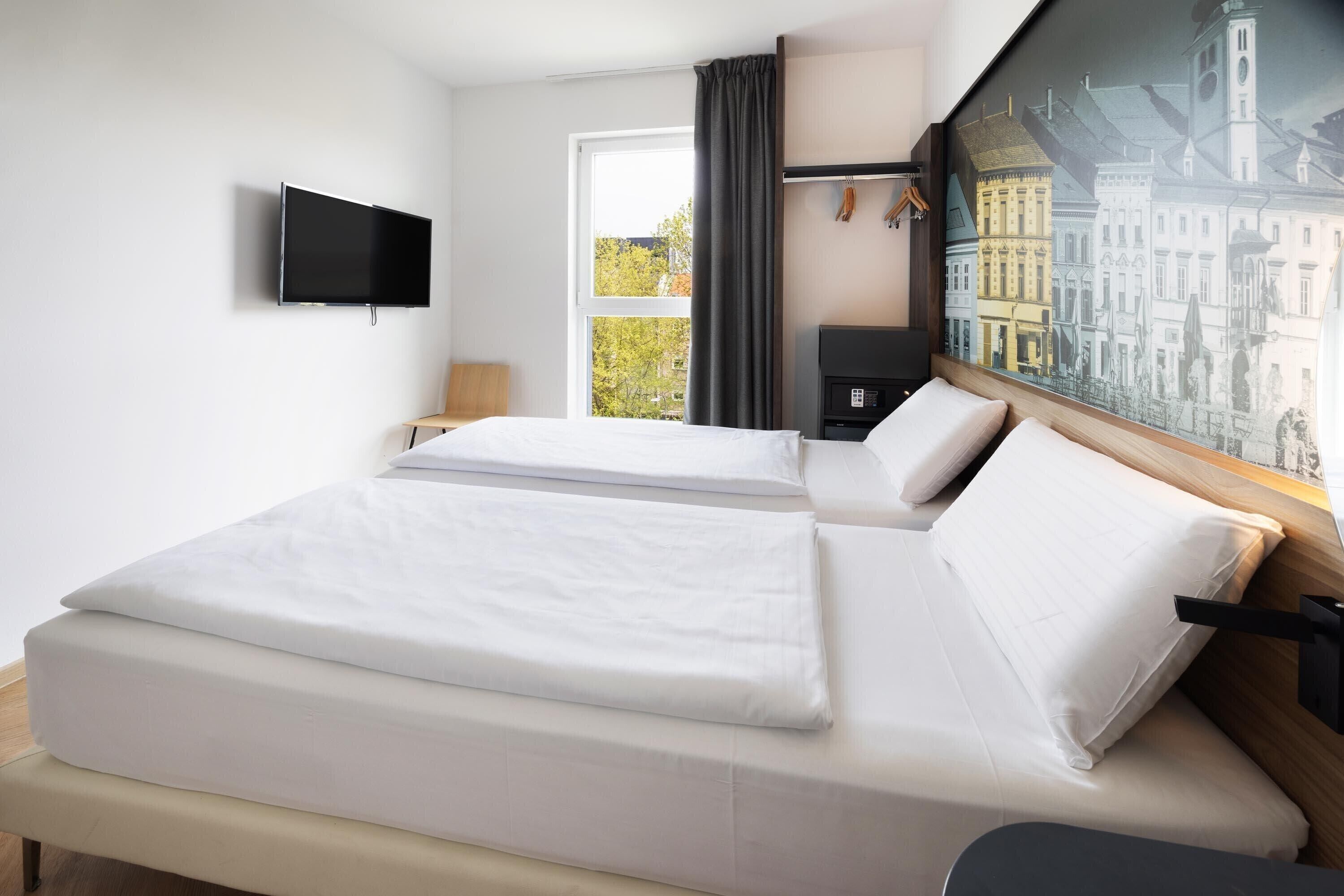 Habitación estándar con 2 camas individuales | Escritorio, wifi gratis, ropa de cama