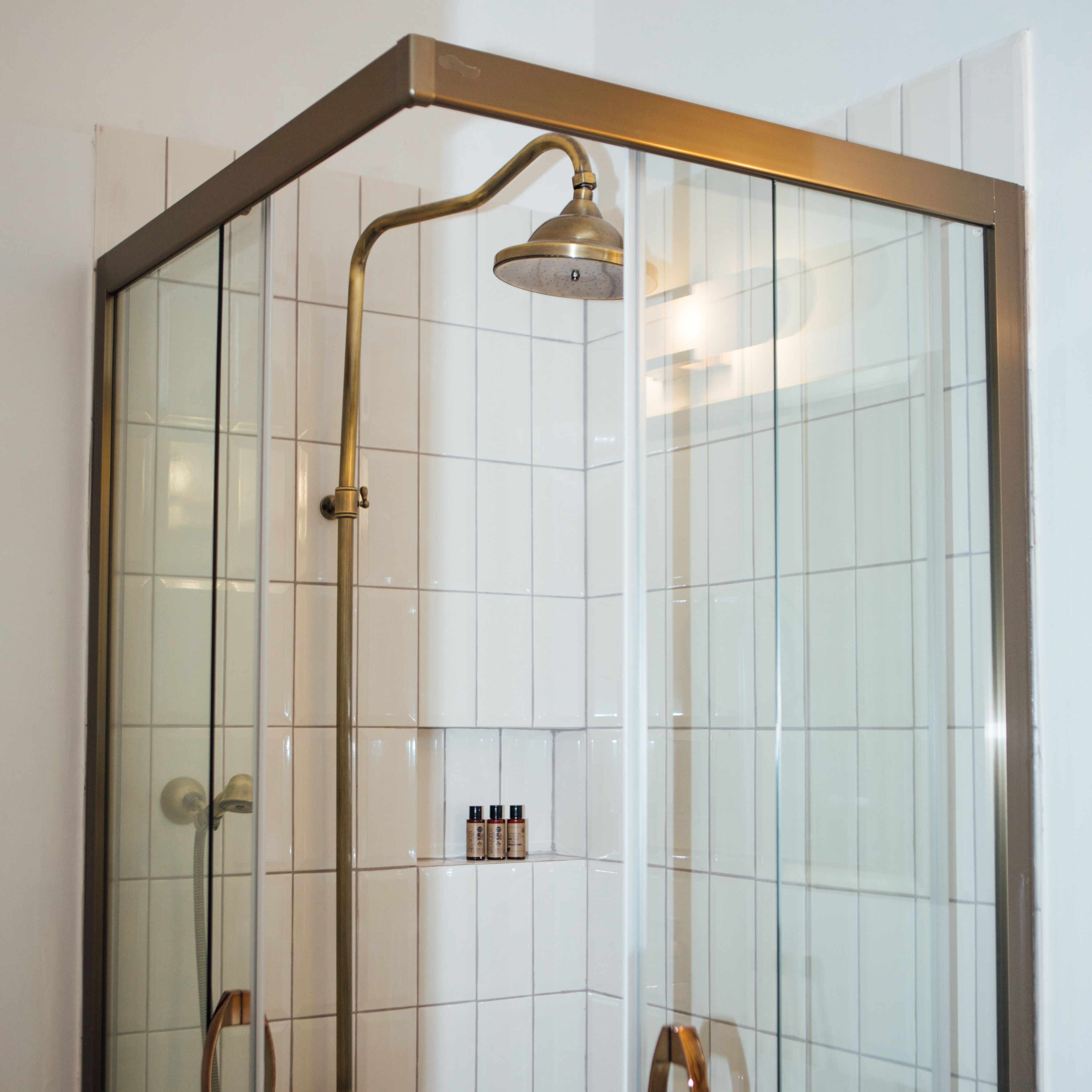 deluxe room | bathroom | shower, free toiletries, hair dryer, slippers