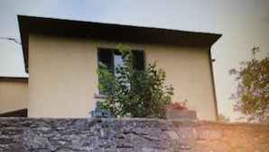 A building with a sloped roof and a window. - Sestino, Sasso di Simone Natural Park (Sestino)