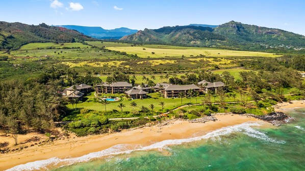 A resort with multiple buildings, a pool, and a beachfront. - Kahalani Resort #106 By Parrish Kauai - Eastside fun in the sun on the ocean (Lihue)
