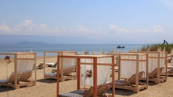 Private beach, sun loungers, beach umbrellas