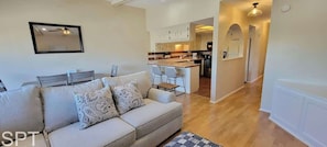 Apartment, Multiple Beds, Patio, Garden View | Living area | TV