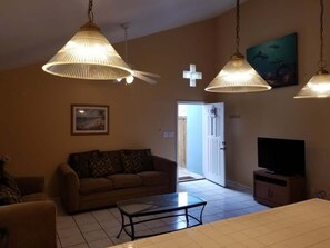 House, Multiple Beds, Patio, Garden View | Living area | TV - Blue Siren House (South Padre Island)