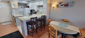 Condo, Multiple Beds, Balcony, Partial Sea View | Private kitchen | Fridge, microwave, oven, stovetop