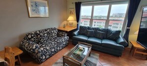 Condo, Multiple Beds, Balcony, Partial Sea View | Living area | TV
