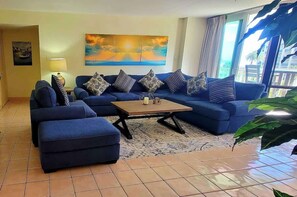 Apartment, Multiple Beds, Balcony, Pool View | Living area | TV