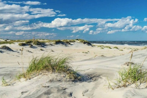 Beach nearby, sun loungers
