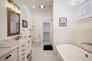 Shower, hair dryer, towels, shampoo