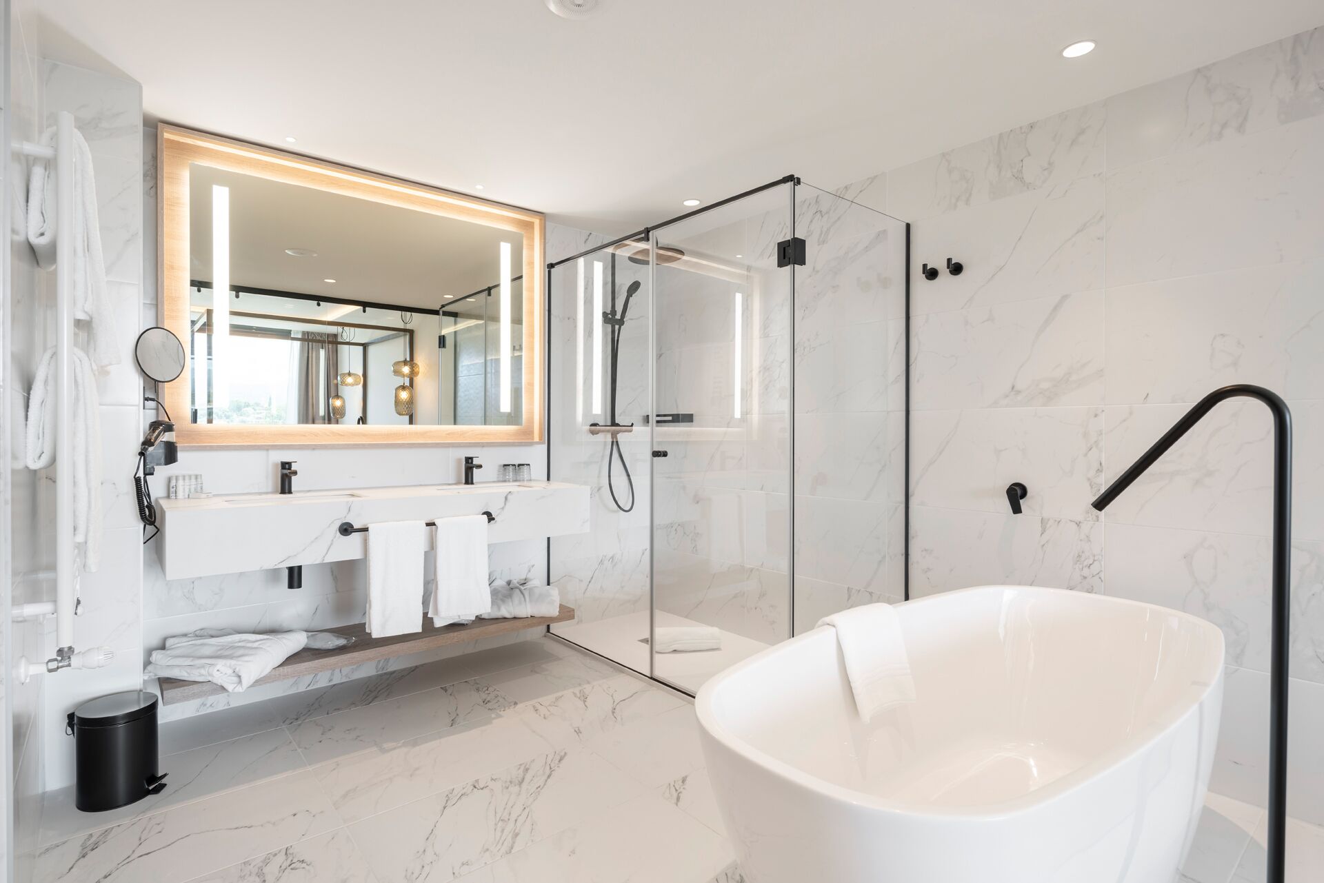 premium studio suite | bathroom | shower, hair dryer, dressing gowns, slippers