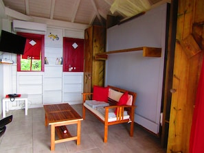 Estúdio panorâmico, vista para o mar, ao lado da praia | Lounge