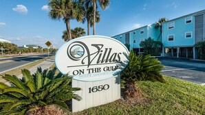 A sign for Villas on the Gulf, indicating private condominiums. - 🌊Great Family Condo-Pool-Steps2Beach-2BR Villas On The Gulf C5🌊 (Pensacola Beach)