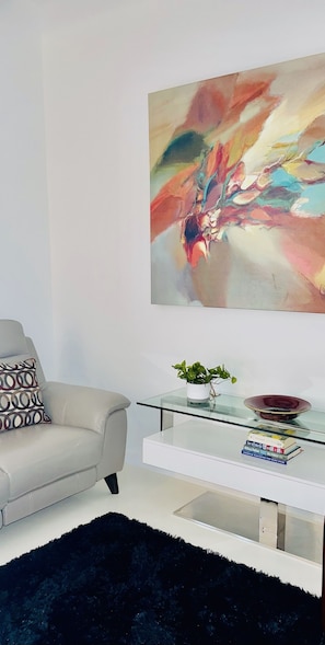 Smart TV, fireplace, books