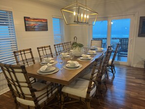 Enjoy meals in this dining area with a long table and six comfortable chairs.