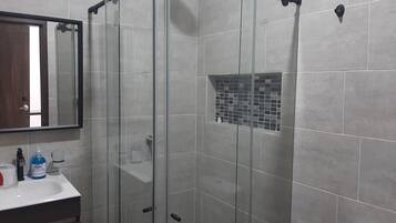 Shower, hair dryer, towels, soap