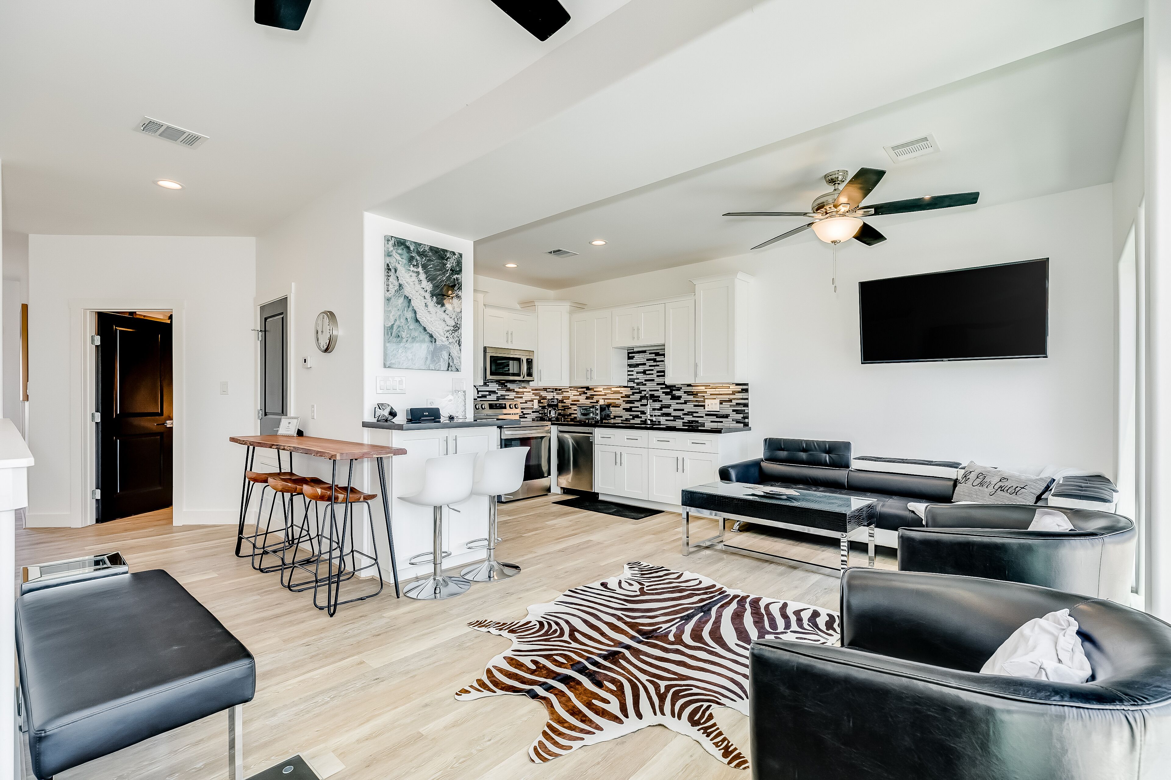 Waterfront home with enclosed yard, rooftop deck, hot tub, & W/D - dogs OK