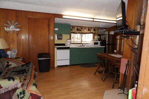 Fridge, microwave, cookware/dishes/utensils