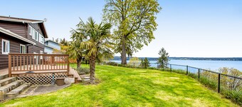 Soundfront home with WiFi, washer/dryer, central AC, and enclosed yard