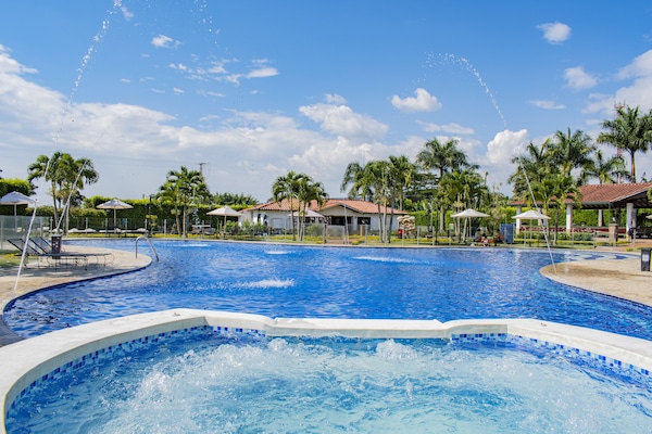 Outdoor pool, pool umbrellas, sun loungers