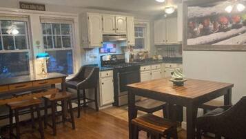 Coffee/tea maker, fridge, microwave, oven