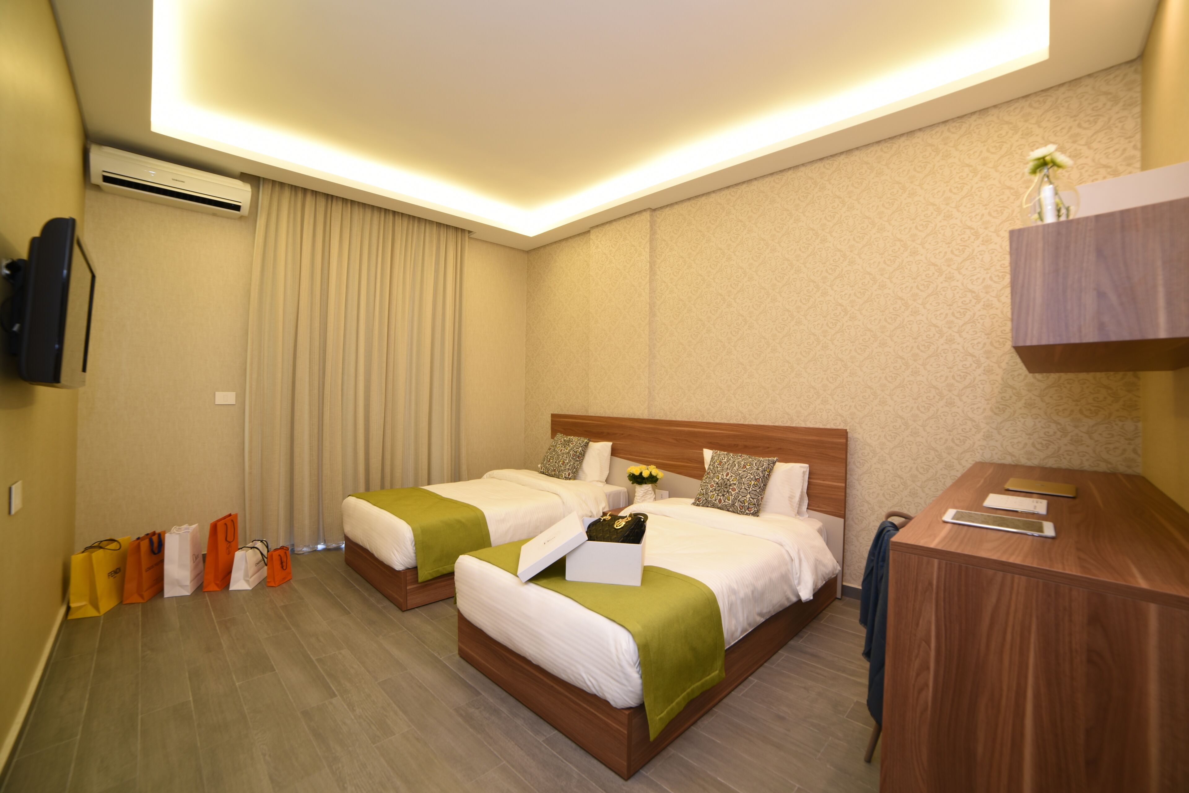 Family Room, 2 Bedrooms | Minibar, in-room safe, individually decorated, individually furnished