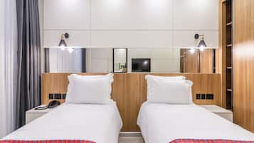 Hypo-allergenic bedding, minibar, in-room safe, desk
