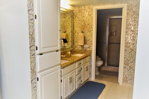 Shower, hair dryer, towels, soap
