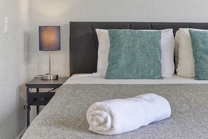 1 bedroom, desk, iron/ironing board, travel cot