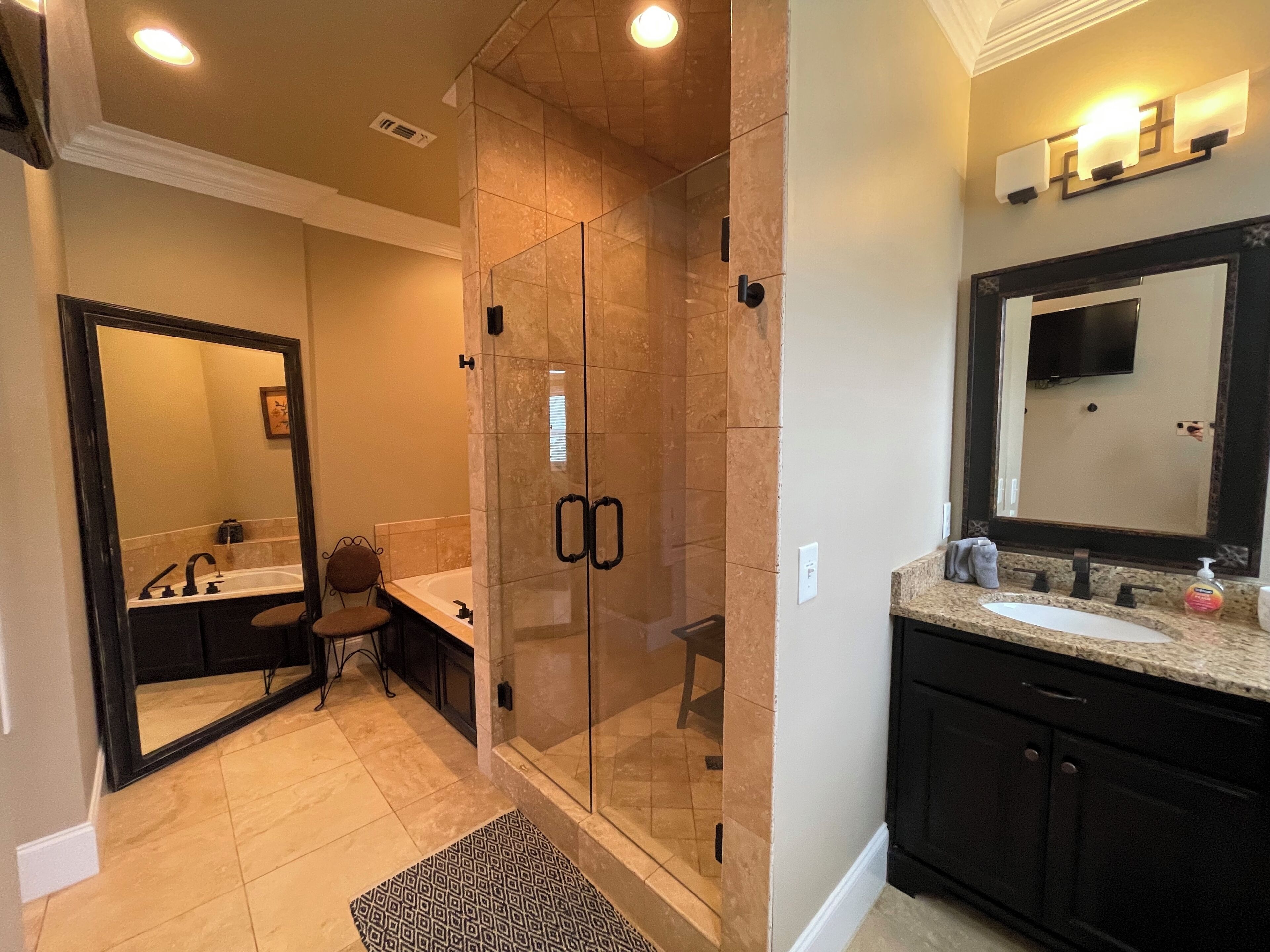 Combined shower/bathtub, hair dryer, towels, soap