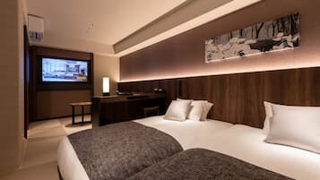 Down duvets, desk, blackout curtains, soundproofing