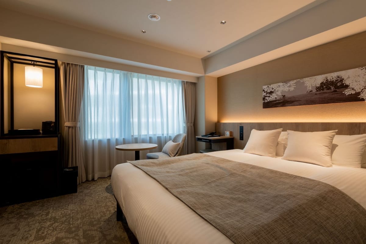 Down comforters, desk, blackout drapes, soundproofing