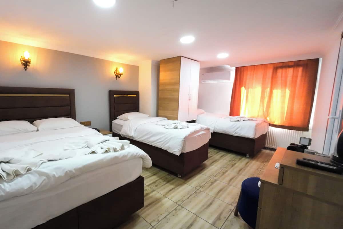 Economy Quadruple Room, 1 Bedroom | Premium bedding, down comforters, soundproofing, free WiFi