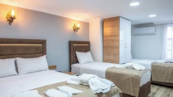 Økonomi-firemannsrom, 1 soverom | Sengetøy av topp kvalitet, dundyner, lydisolert og wi-fi (inkludert)