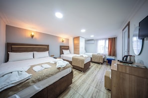 Economy Quadruple Room, 1 Bedroom | Premium bedding, down comforters, soundproofing, free WiFi - Laos Otel (Istanbul)