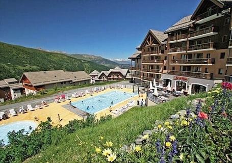 A heated pool. Vacation Apartment "Ski-in/Ski-out" Perfectly Located Year-Round