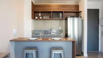 Apartment | Private kitchen | Fridge, microwave, coffee/tea maker, coffee grinder