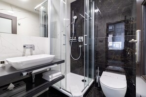 Economy Double Room | Bathroom | Designer toiletries, hair dryer, slippers, towels - Hotel Ikona (Prague)