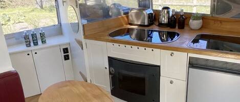 Fridge, stovetop, electric kettle, high chair