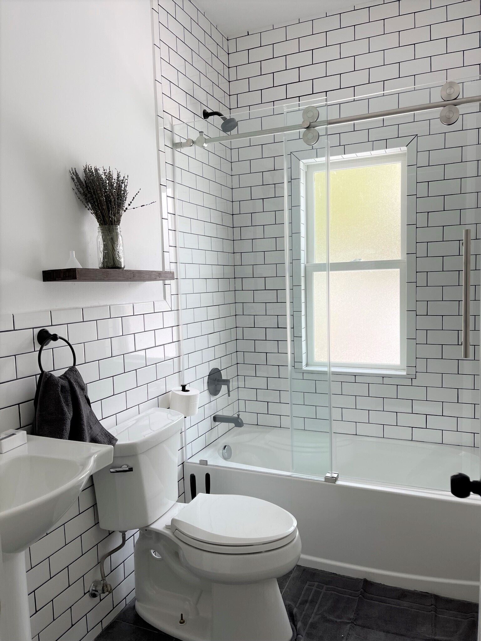 Combined shower/bathtub, hair dryer, towels, soap